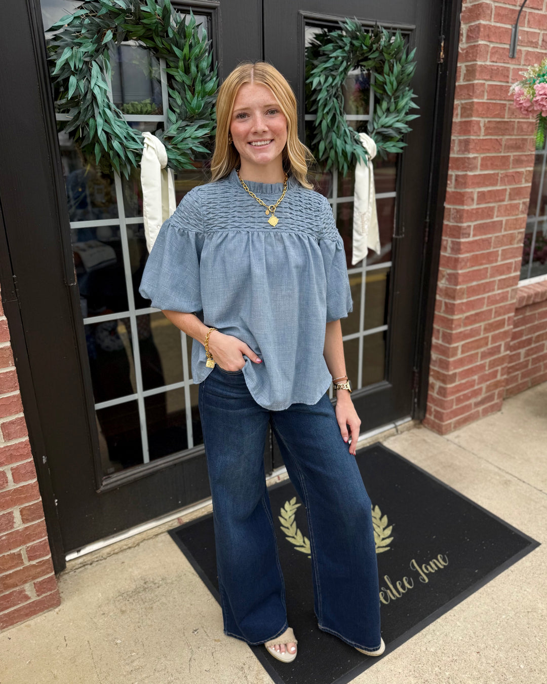 Bubble Sleeve Blouse in blue; available in sizes XS–XL.