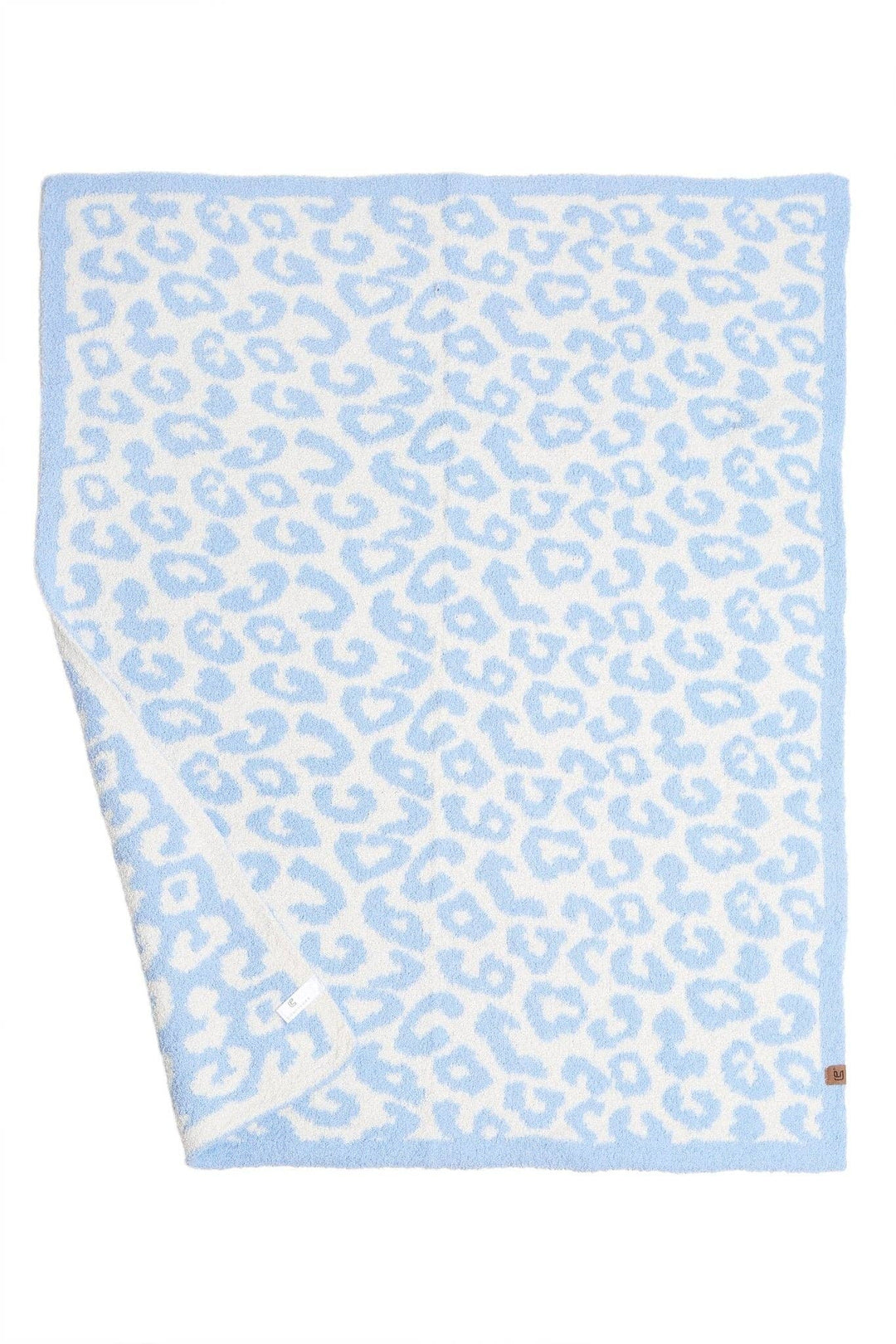 Beige polyester microfiber kids’ blanket with light blue and white leopard print. Sizes: small, medium, large.