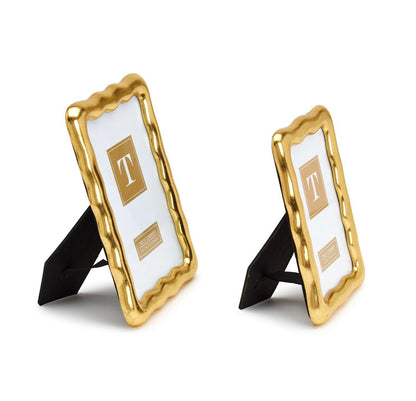 Vintage Ore Photo Frames with gold leaf finish, available in 5x7 and 4x6 sizes. Features black easel backs.