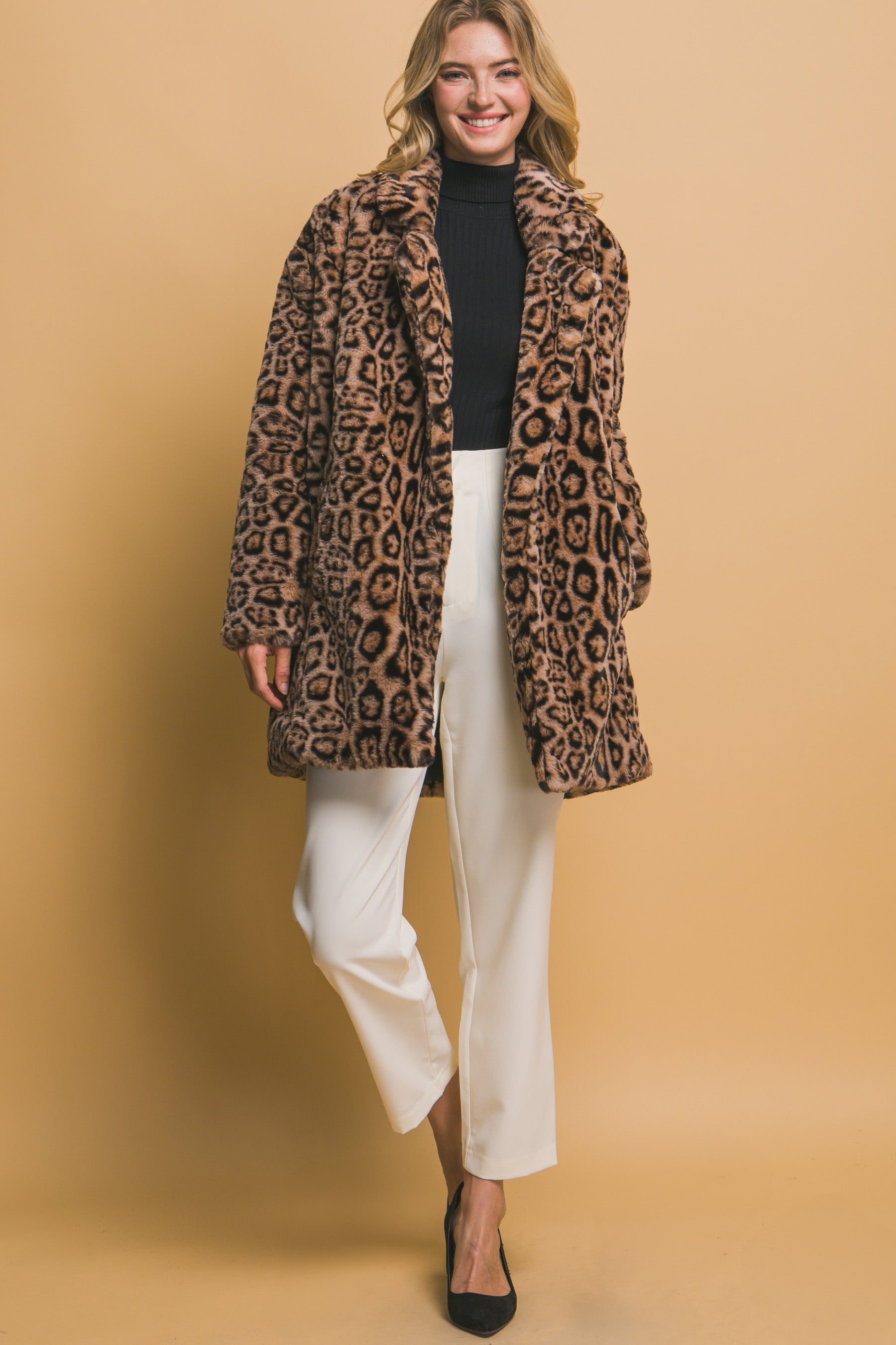 Animal Print Faux Fur Coat: A chic faux fur coat with an animal print design. Available sizes: XS, S, M, L, XL.