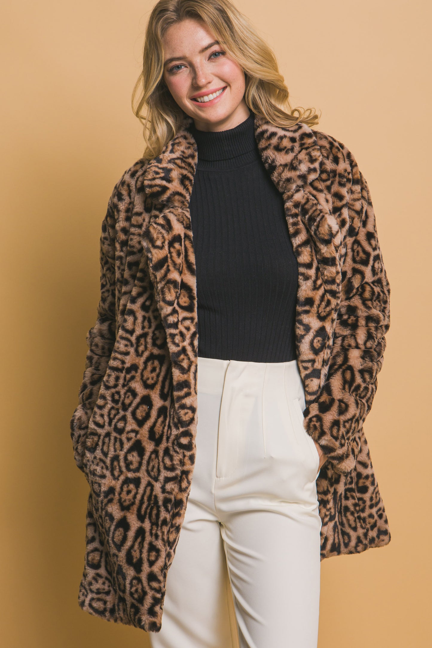 Animal Print Faux Fur Coat: A stylish and cozy coat with an eye-catching animal print design. Available sizes: XS, S, M, L, XL.