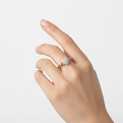 The Ring Edit: gold band with heart-shaped cluster of sparkling stones. Available in sizes 5-9.