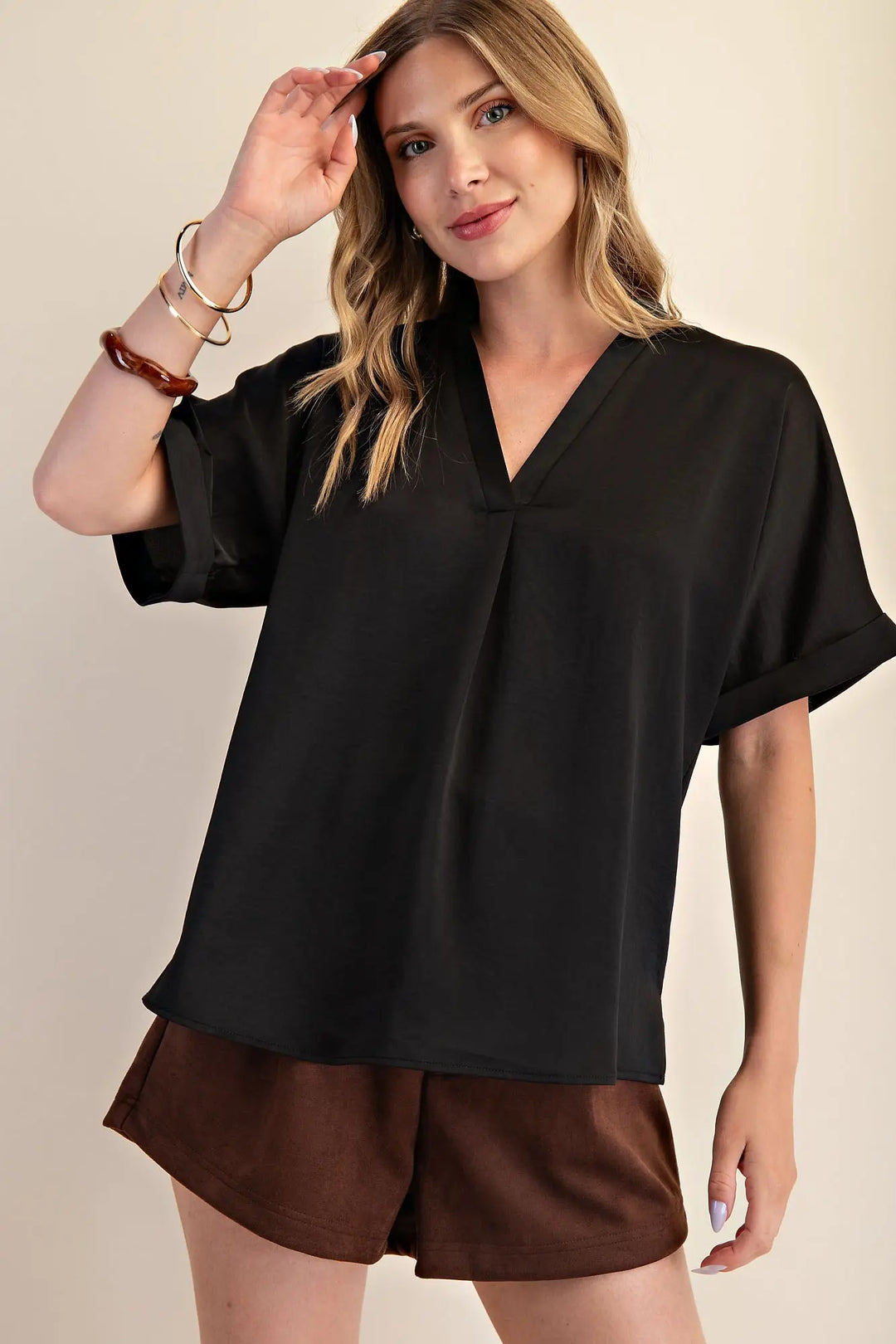 Black Signature Satin Top shown; available in sizes XS–XL.