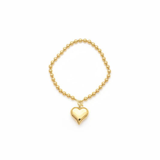 Gold Heart Necklace with shiny heart-shaped charm, available in 16″, 18″, and 20″ lengths.
