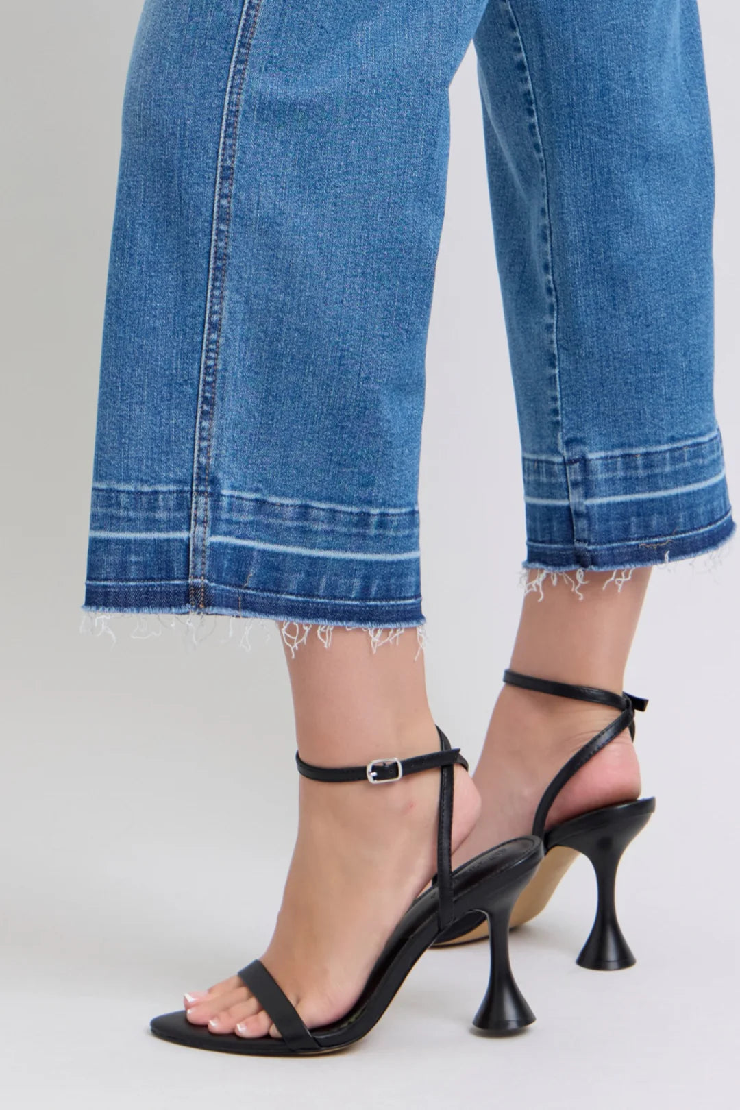 Judy Blue HW Control Release Hem Crop Wide jeans with frayed hems. Available in sizes 0-20.