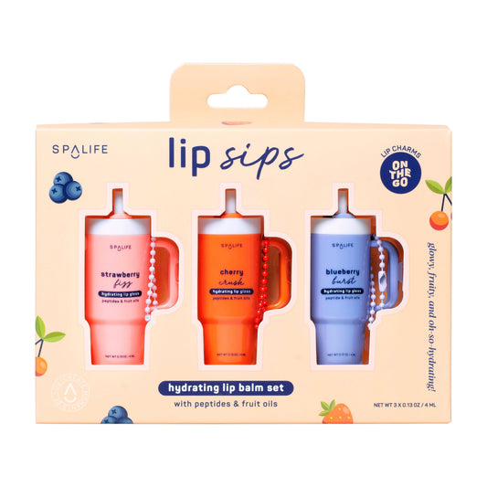 Lip Sips Hydrating Lip Balm Set: 3 fruit-flavored, cup-shaped balms with keychains. Sizes not specified. Box labeled "lip sips.