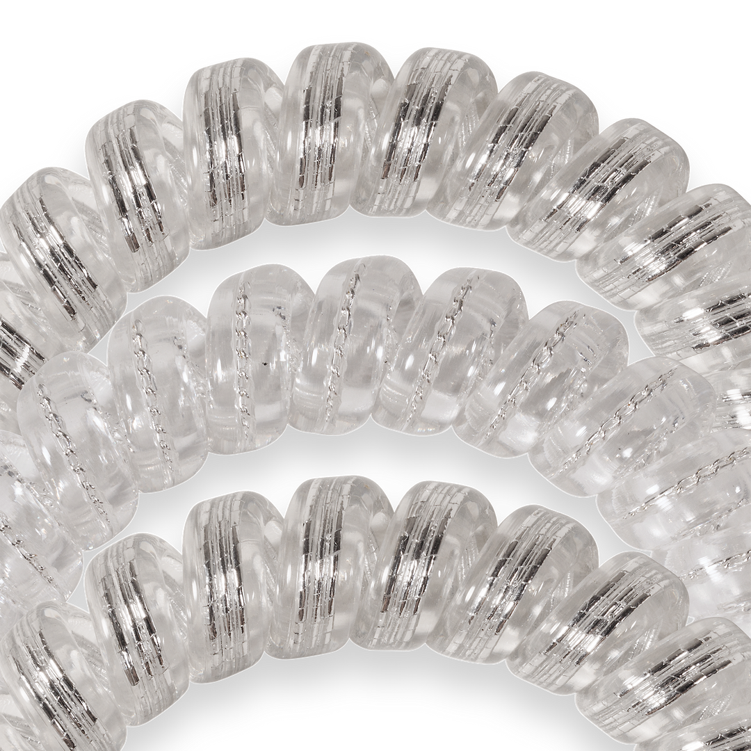 Two metallic silver Spiral Hair Coils, Silver Slay Hair Ties. Available in small and large sizes for secure hold.