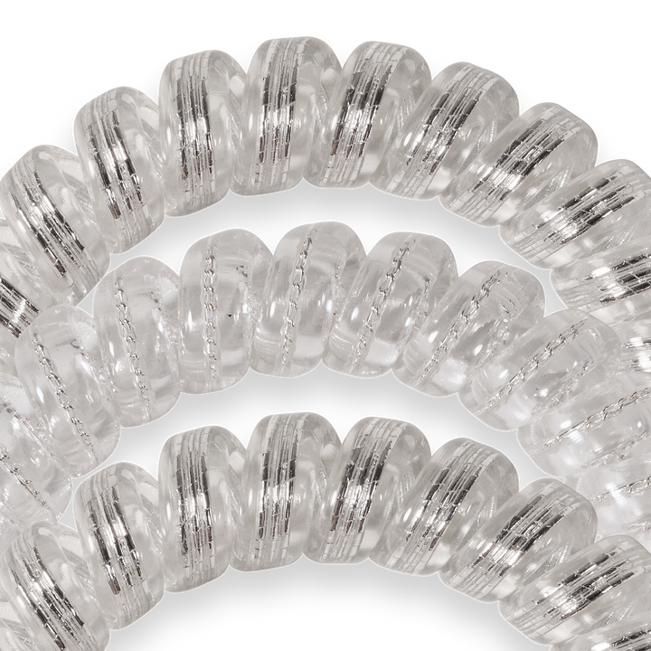 Two metallic silver Spiral Hair Coils, Silver Slay Hair Ties. Available in small and large sizes for secure hold.