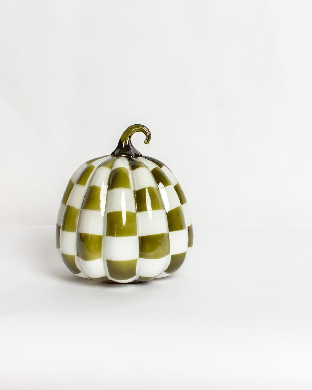 The Harlowe Pumpkin | White & Green has a green and white checkerboard pattern with a curved stem. Available in multiple sizes.