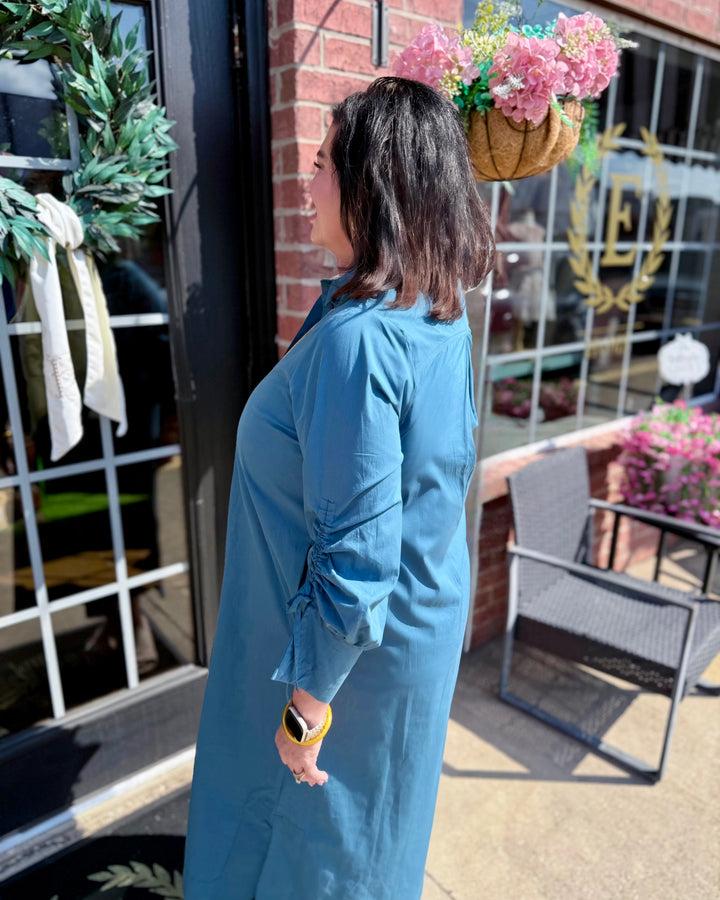 Teal Collared Button Detail Relaxed Midi Dress with a relaxed fit. Available in sizes XS–XL.