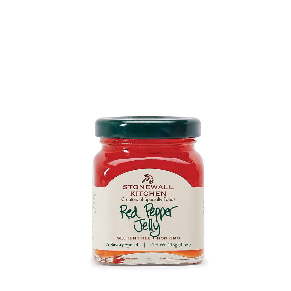 4oz jar of Red Pepper Jelly with green lid and white label; bright red jelly, gluten free, non-GMO.
