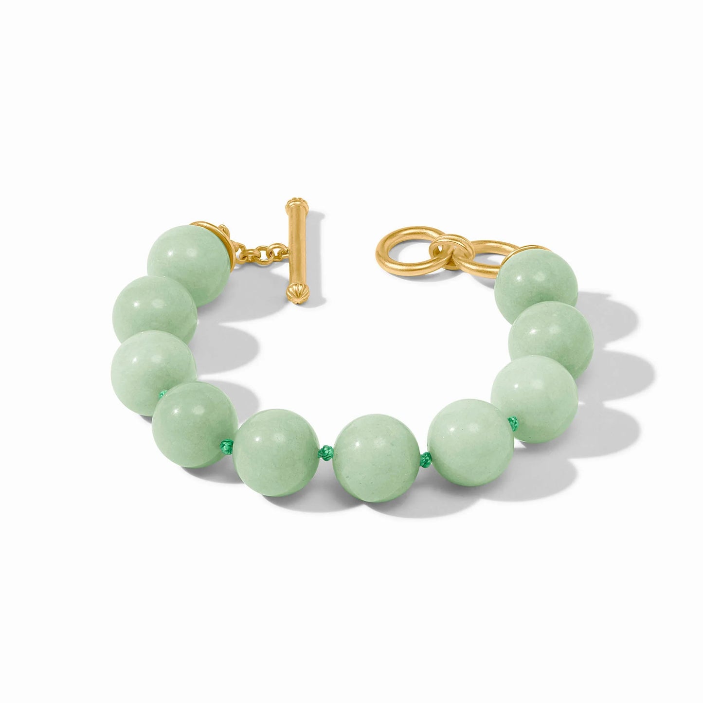 Light green jade bead jewelry with a gold toggle clasp, 24K gold-plated. Available in multiple sizes.