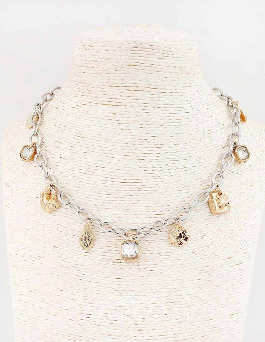 Flynn Gold Silver Necklace with crystal charms and geometric pendants. Available in 16", 18", and 20" lengths.