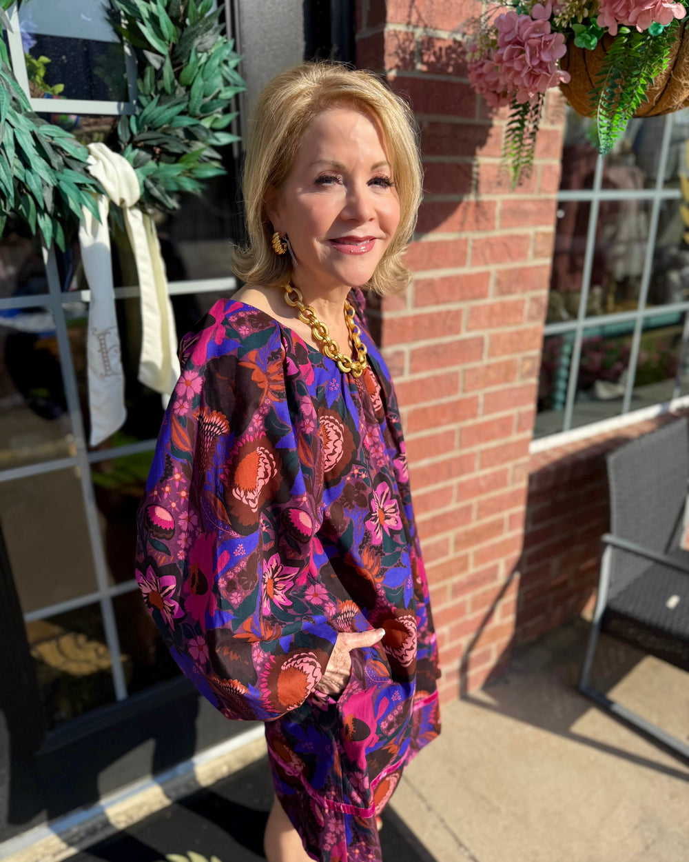 Shirred Floral Shift Dress with a colorful fall floral pattern. Available in sizes XS–XL.