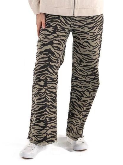 Zebra Print Wide-Leg Jean with high-rise waist and frayed hems. Available in sizes 24–32.