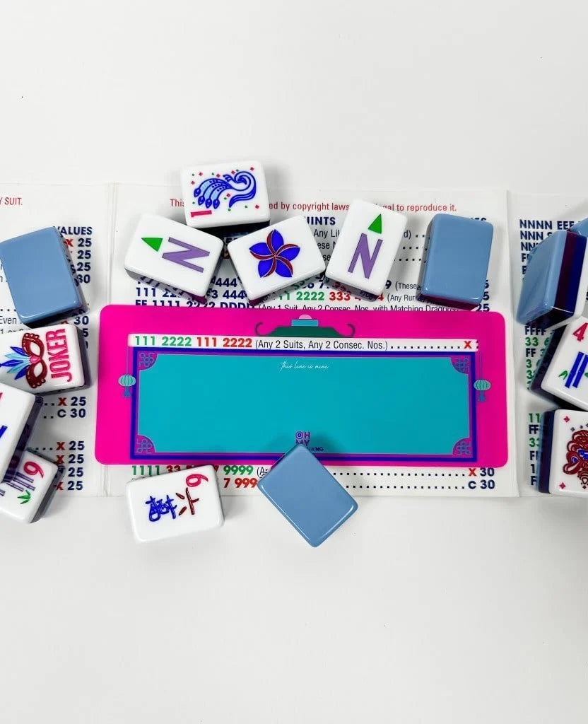 Pink and teal Mahjong Line Finder accessory, available in small and large sizes.