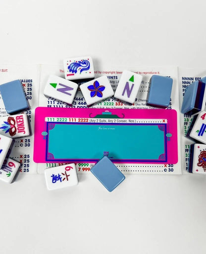 Pink and teal Mahjong Line Finder accessory, available in small and large sizes.