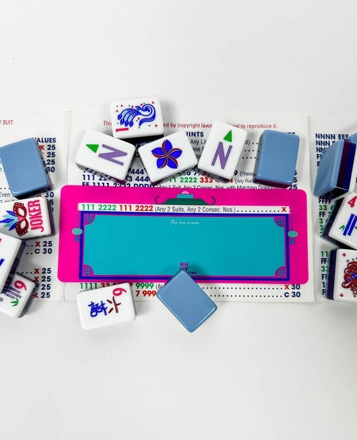 Pink and teal Mahjong Line Finder accessory, available in small and large sizes.