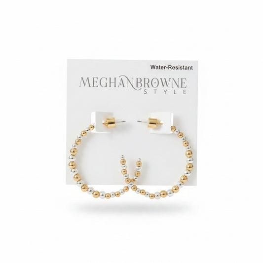 The Spirit Gold Silver Earrings are gold and silver beaded hoops, water-resistant, available in multiple sizes.