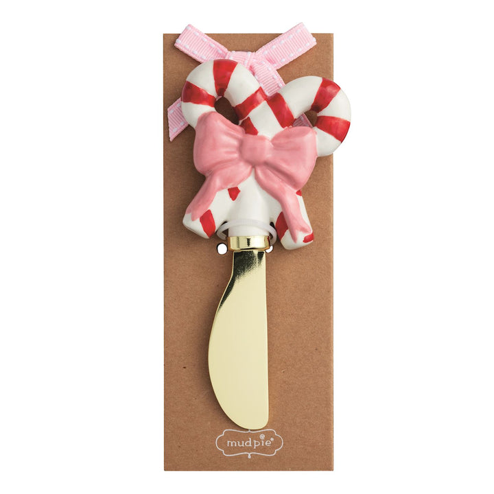 Christmas Whimsy Spreader with candy cane handle, pink bow, and gold-toned metal blade.