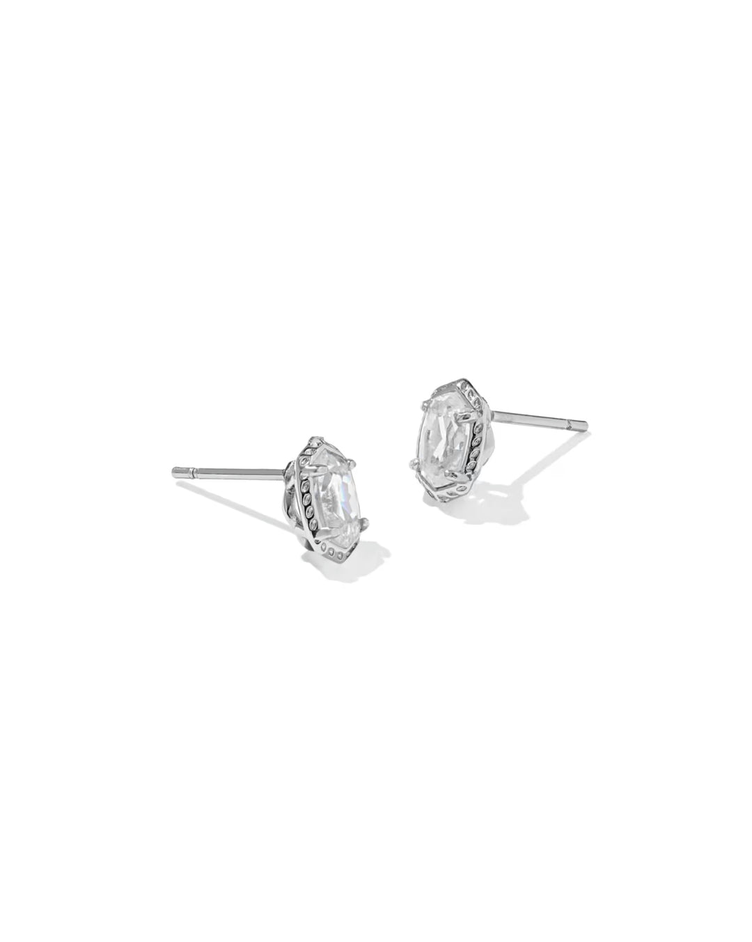 Mini Ellie Luxe Stud Rhodium Earrings with oval clear crystals in a silver-toned frame.