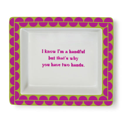 Rectangular white porcelain tray, green and pink border, pink text: "I know I'm a handful..." Size: 8" x 5".