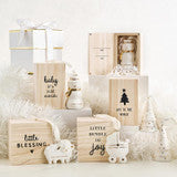 Baby’s First Christmas“ ceramic ornament and personalized baby ornaments in matching wooden keepsake boxes with holiday motifs.