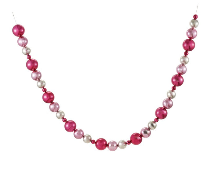 Pink and silver ball garland with alternating spherical ornaments on a thin cord.