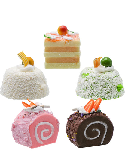 Five faux baked goods: layered and roll cakes with icing, fruit, and chocolate decor. Available in multiple sizes.