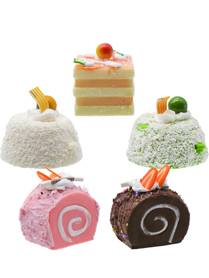 Five faux baked goods: layered and roll cakes with icing, fruit, and chocolate decor. Available in multiple sizes.