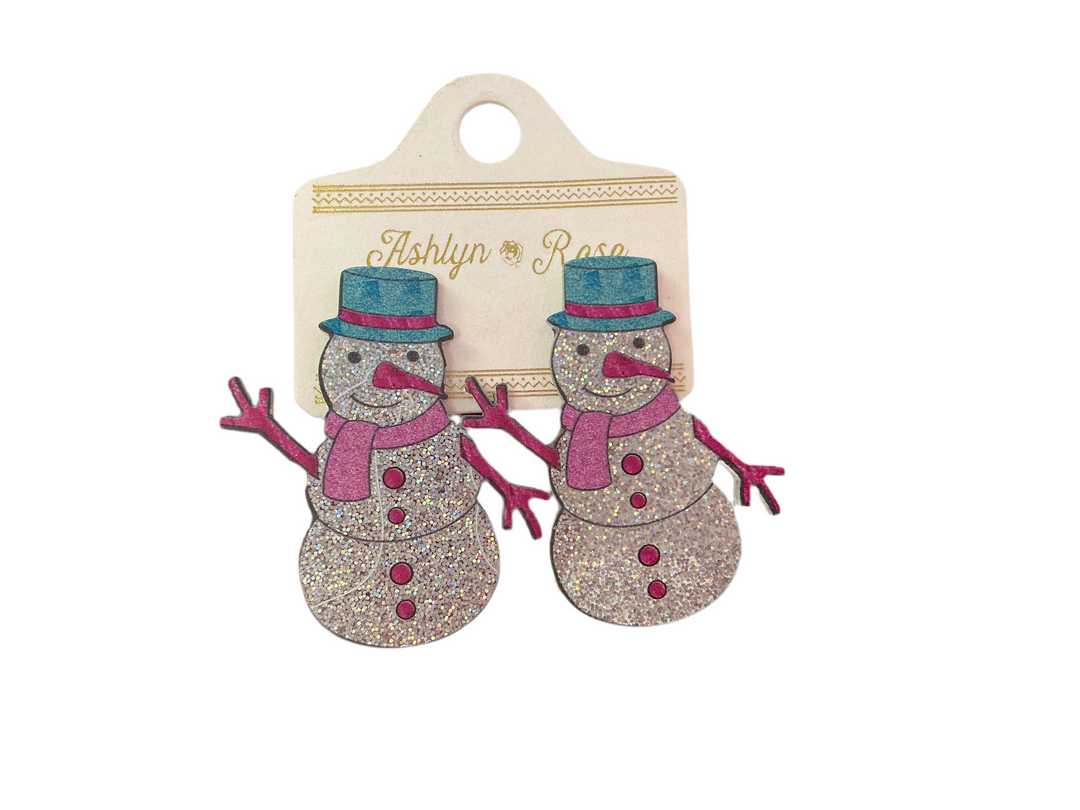 Glitter snowman earrings with blue top hats, pink scarves, and pink twig arms. Available in all sizes.
