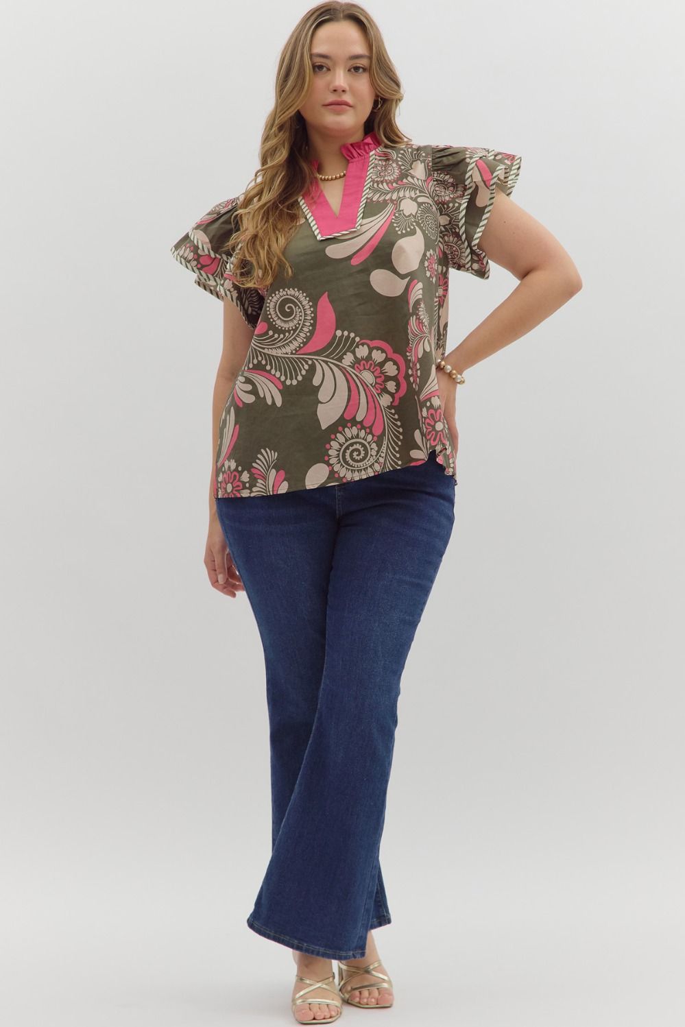 Paisley Tiered Top: olive green cotton, pink and white swirls, flutter sleeves, pink neckline. Sizes XS–XXL.