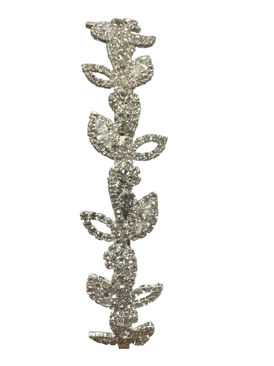 Crystal headband with floral design, featuring sparkling leaf and petal stones. Available in small, medium, and large sizes.