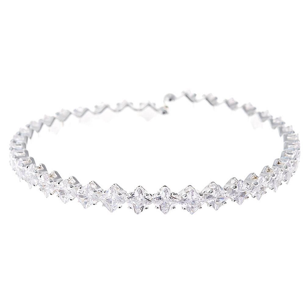 Silver open cuff bracelet with a row of closely set round sparkling stones. Available sizes: small, medium, large.