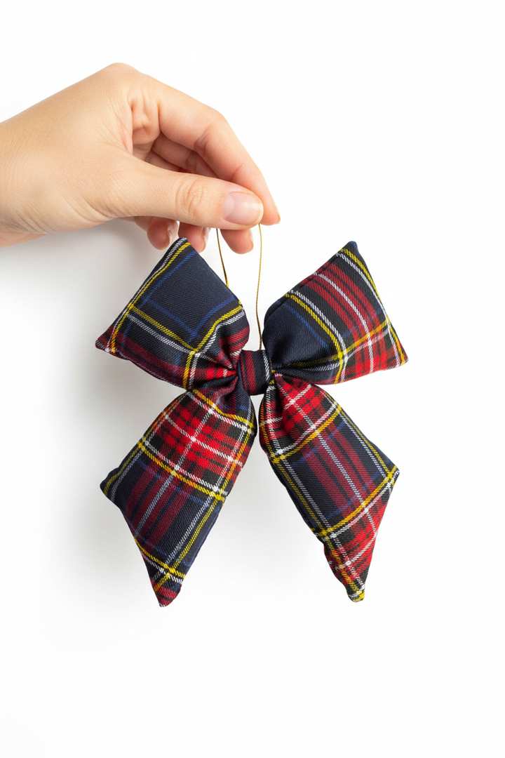 Campbell Bow Ornament | Plaid, fabric ornament with a red, navy, yellow, and white bow pattern.