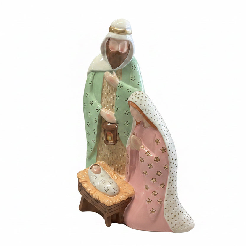 Pastel Nativity scene with Joseph, Mary, and baby Jesus in a manger, featuring soft pastel colors and floral patterns. Available in various sizes.