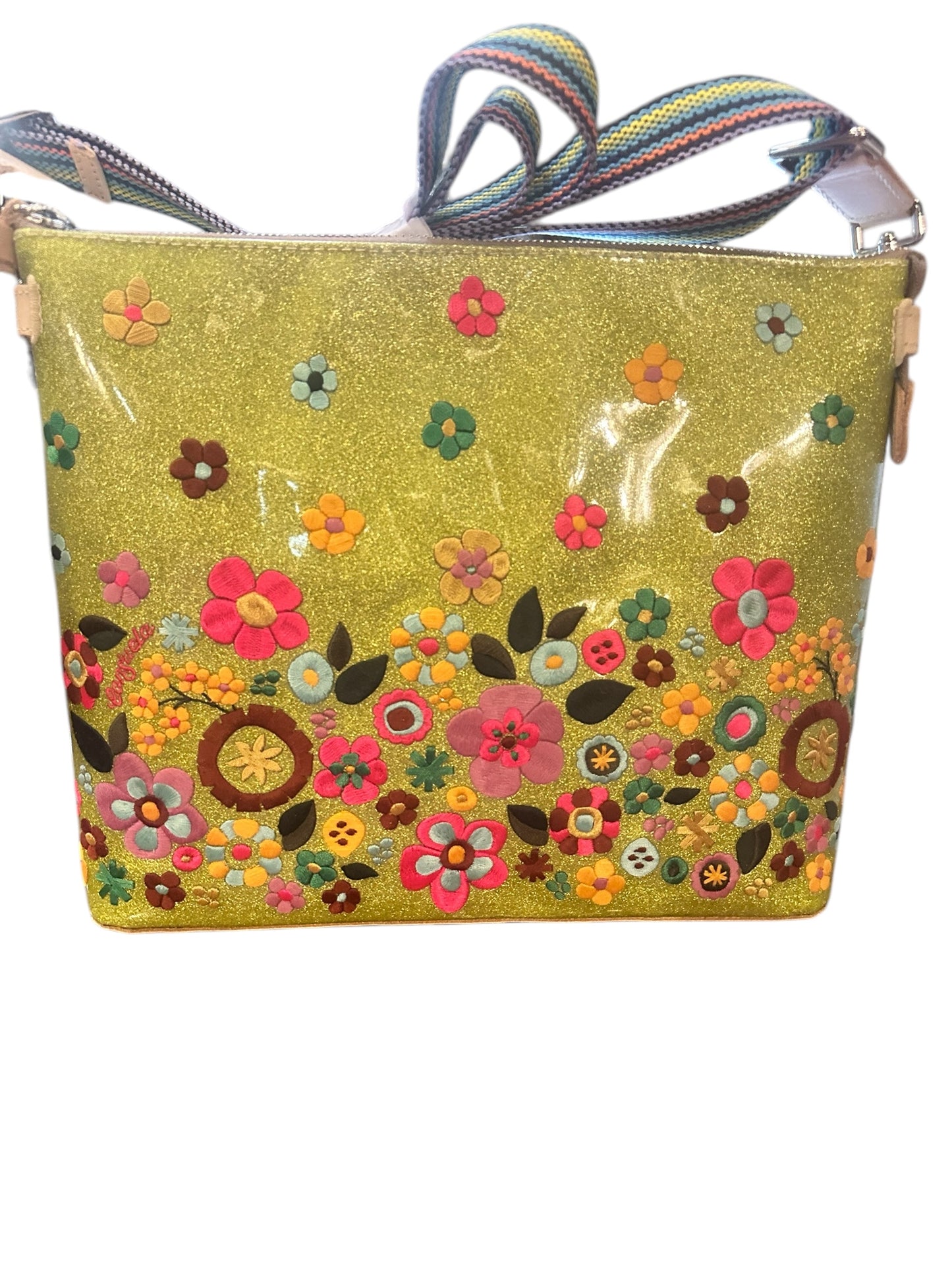 Bright yellow glittery crossbody with colorful flower accents, multicolored strap; available in small and medium sizes.