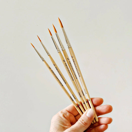 Watercolor Paintbrush Set: five wood-handled, fine-tipped round brushes in sizes including round 2 and round 4.