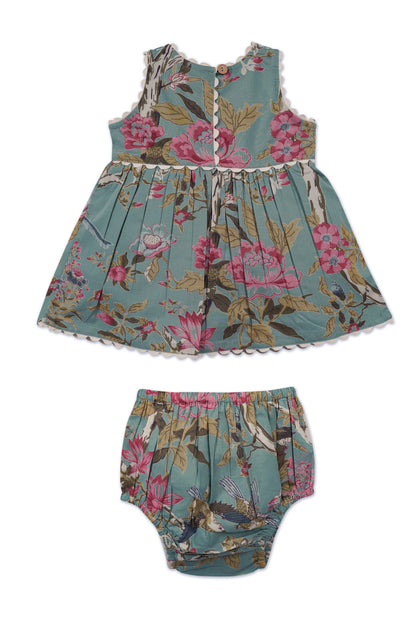 Sara Floral Dress in Sage for infants, sleeveless with scalloped edges, pink/cream/brown floral print. Sizes: 0-3M to 18-24M.