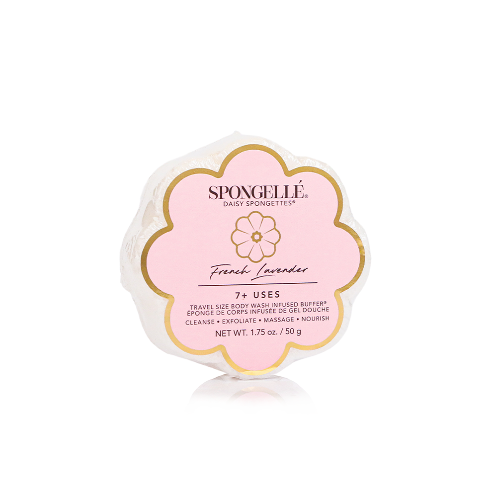 French Lavender Daisy Spongette: round, flower-shaped bath sponge in pink/white "7+ Uses" packaging. Size: standard.