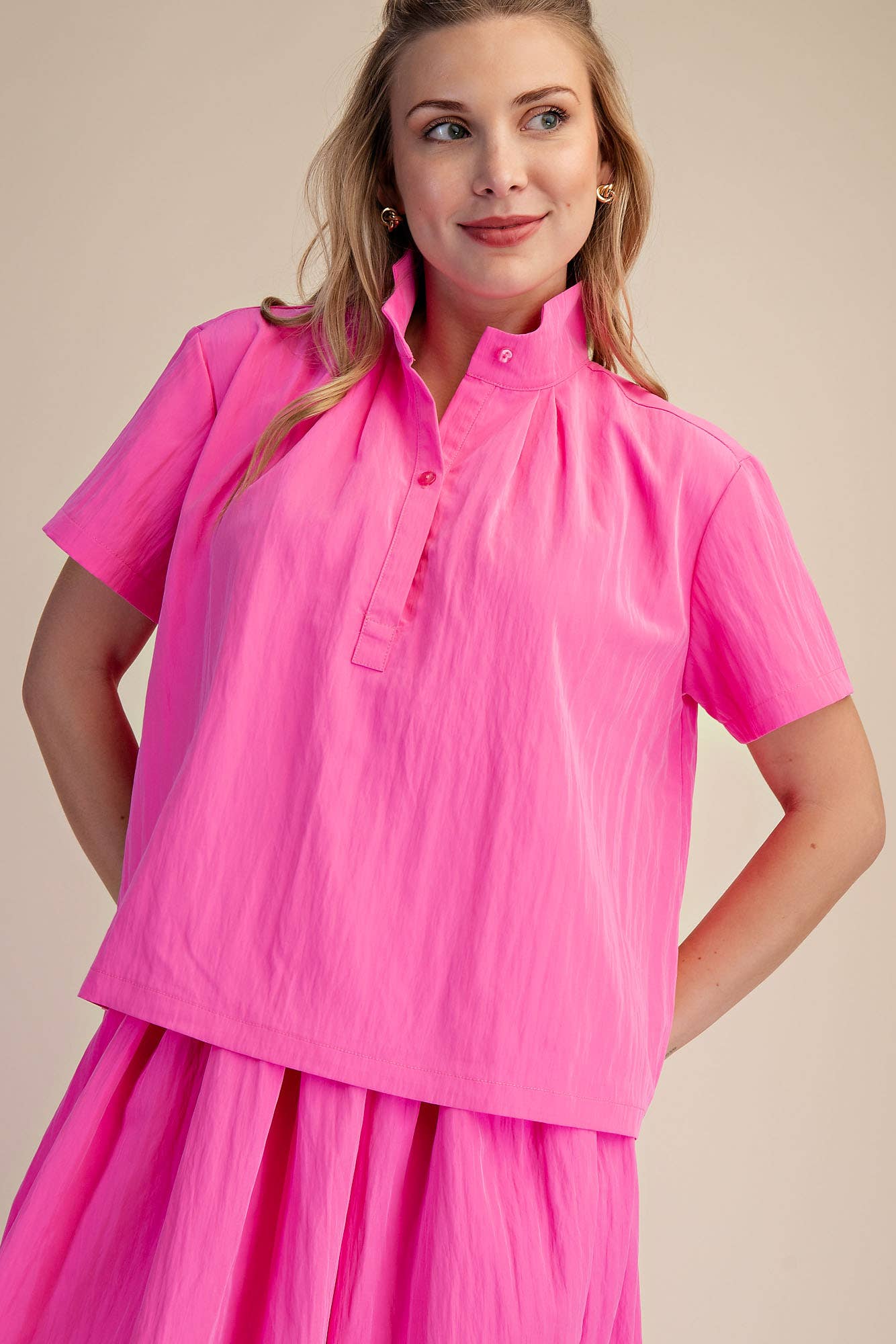 Pink Stand Collar Short Sleeves Shirt; available in sizes XS-XL. Features short sleeves and a stand collar design.