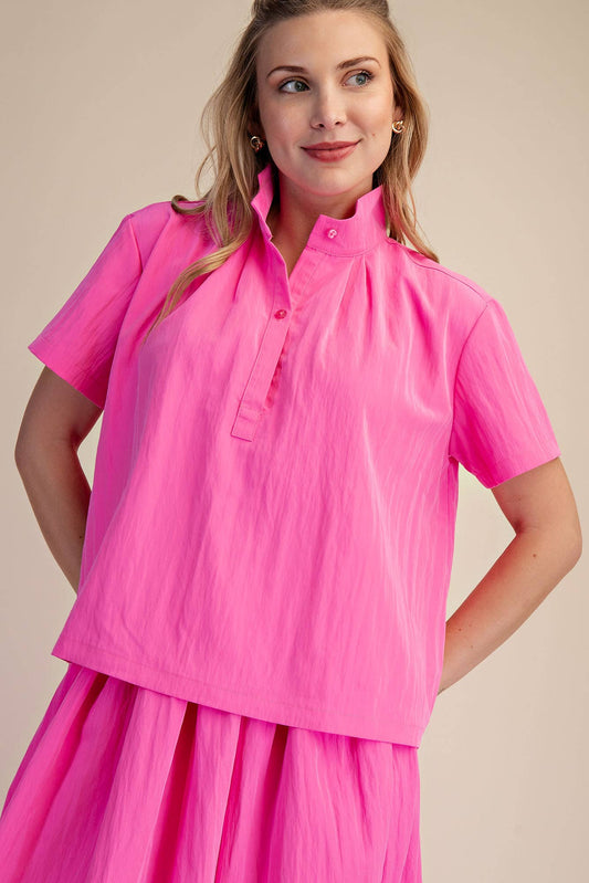 Pink Stand Collar Short Sleeves Shirt; available in sizes XS-XL. Features short sleeves and a stand collar design.