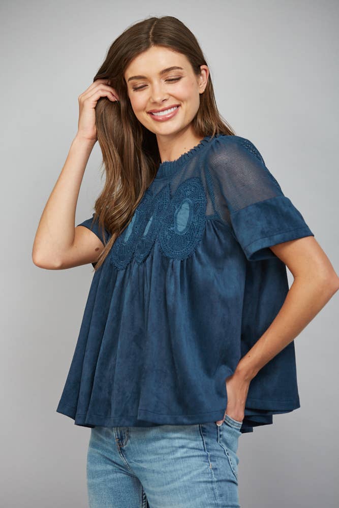 Teal blue faux suede top, size L, featuring a sheer mesh upper panel with lace applique.