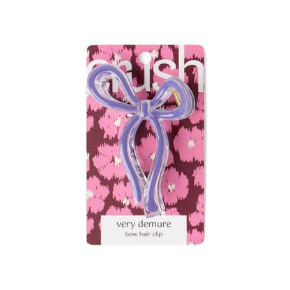 Lavender bow hair clip on pink-purple card. Available in small and large sizes.