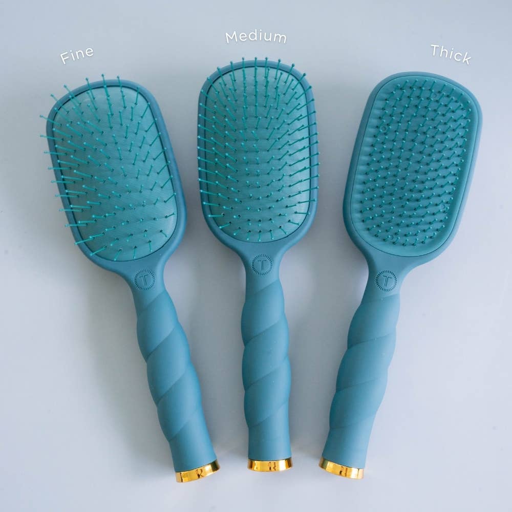 Teal With It Detangler Hair Brush for medium hair, featuring optimal bristle density; available in medium size.