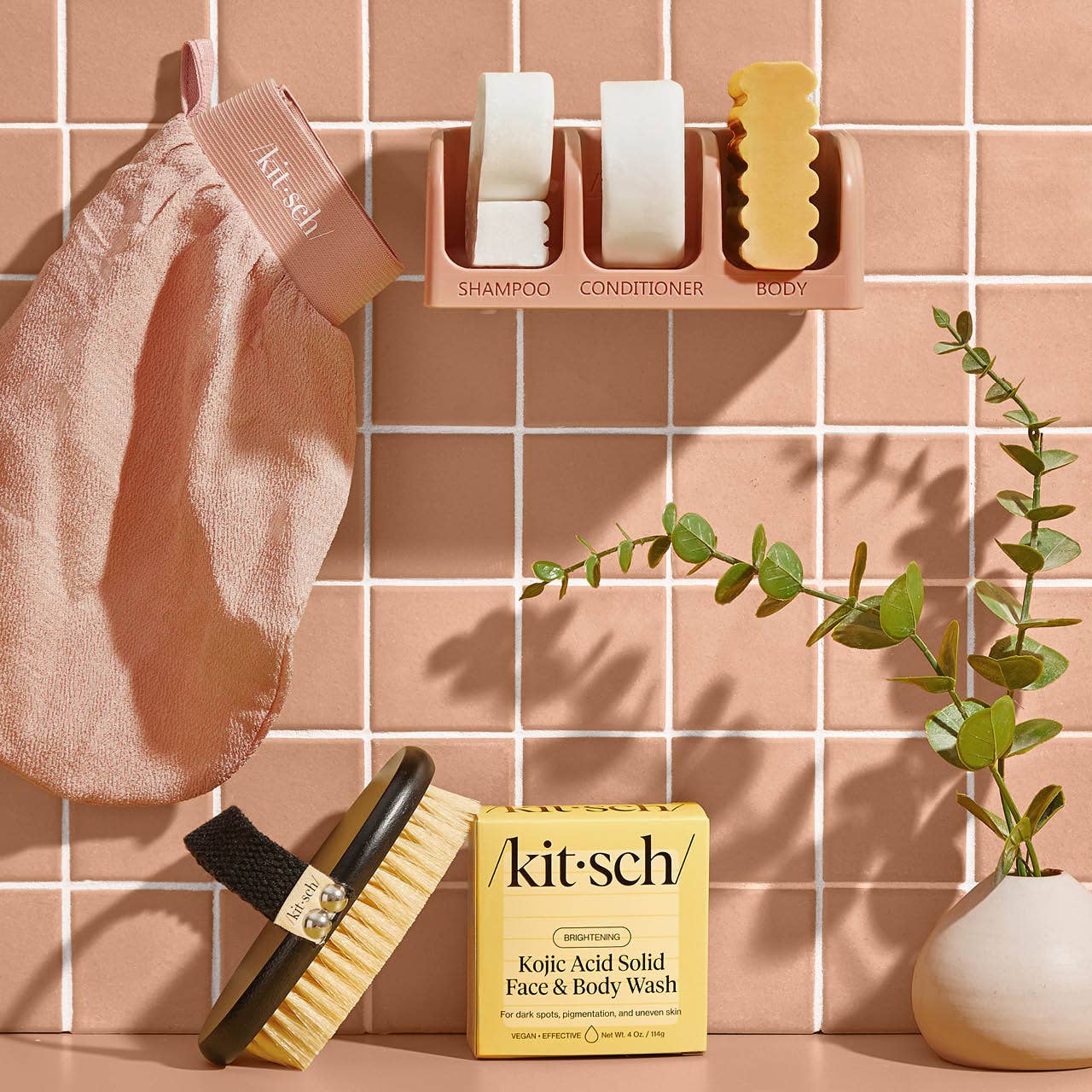 Yellow box of Kojic Acid Face and Body Bar, available in 65g and 135g sizes.