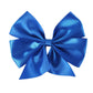 This is a Royal Blue Satin Bow Hair Clip featuring a classic double-looped design. The vibrant finish makes it the perfect accessory for any outfit. It's displayed on its own without any other items for distraction. Available in one standard size.