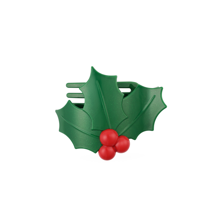 Glitter holly leaves flat hair clip with three red berries.