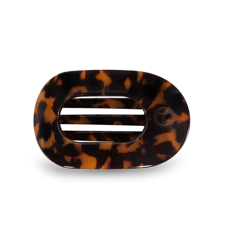 TELETIES Flat Round Hair Clip: oval tortoiseshell, two horizontal slats, circular accent. Sizes: small, medium, large.