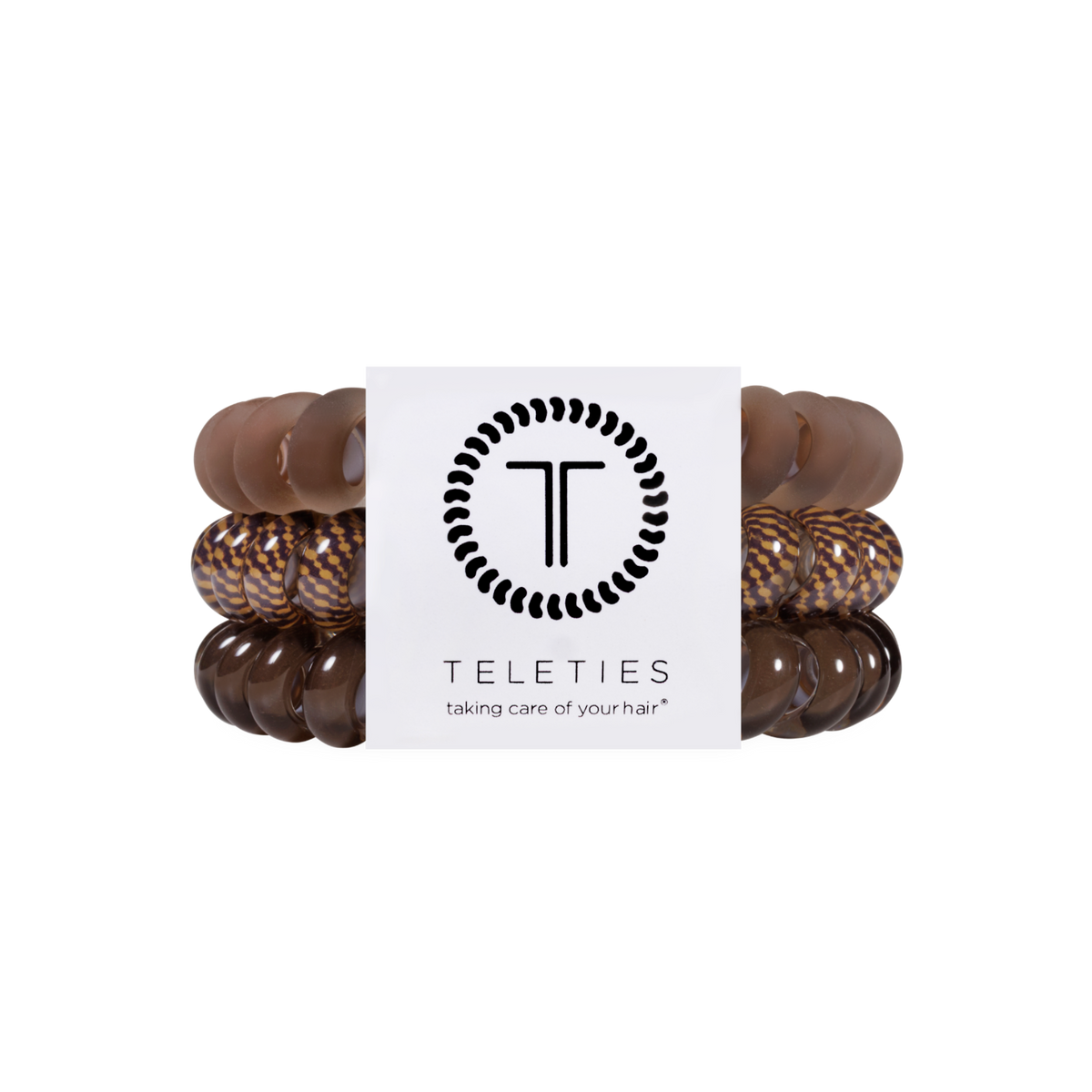 Set of five large Morning Brew Hair Ties in brown and patterned colors, with a white label showing the TELETIES logo and tagline, available in large size. No-crease design for all-day hold.